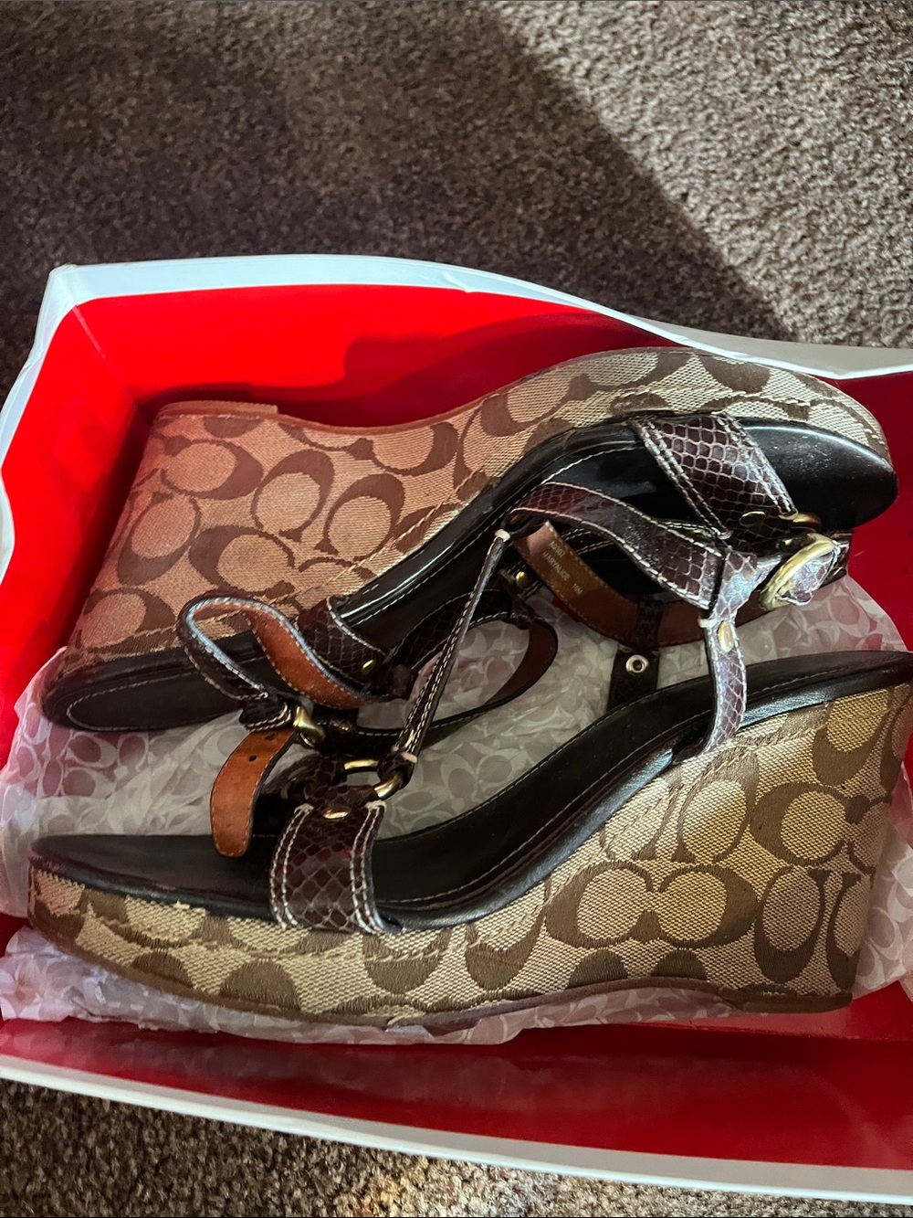 USED GREAT BUY!

Coach Tan & Dark Brown Signature Canvas Wedge Sandals